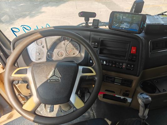 Caminhão basculante Howo amarelo de dois lugares usado, produzido em 2019